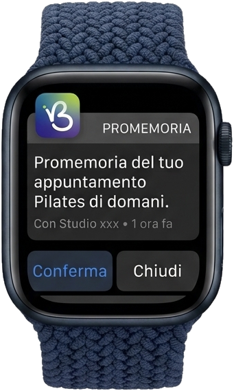 Un promemoria di Book a Vibe sull'orologio: l'appuntamento di pilates del giorno dopo, con il tasto per confermare.